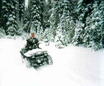 Me 4 wheeling in the snow.